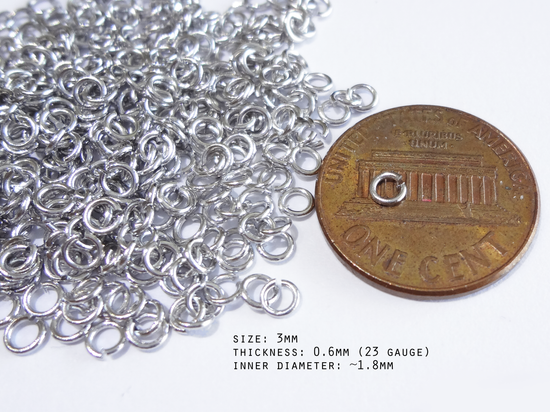 Load image into Gallery viewer, 0.6 x 3mm Silver Open Jump Rings, 23 gauge
