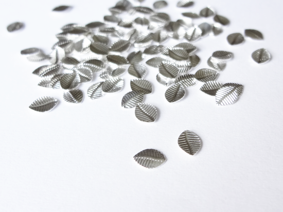 Load image into Gallery viewer, 5x3.5mm Silver Leaf Embellishments
