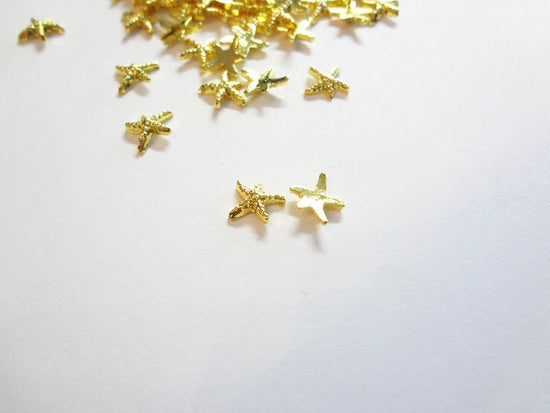 Load image into Gallery viewer, 7mm Gold Starfish Studs
