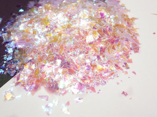 Load image into Gallery viewer, Iridescent Clear Pink Tint Mylar Flakes
