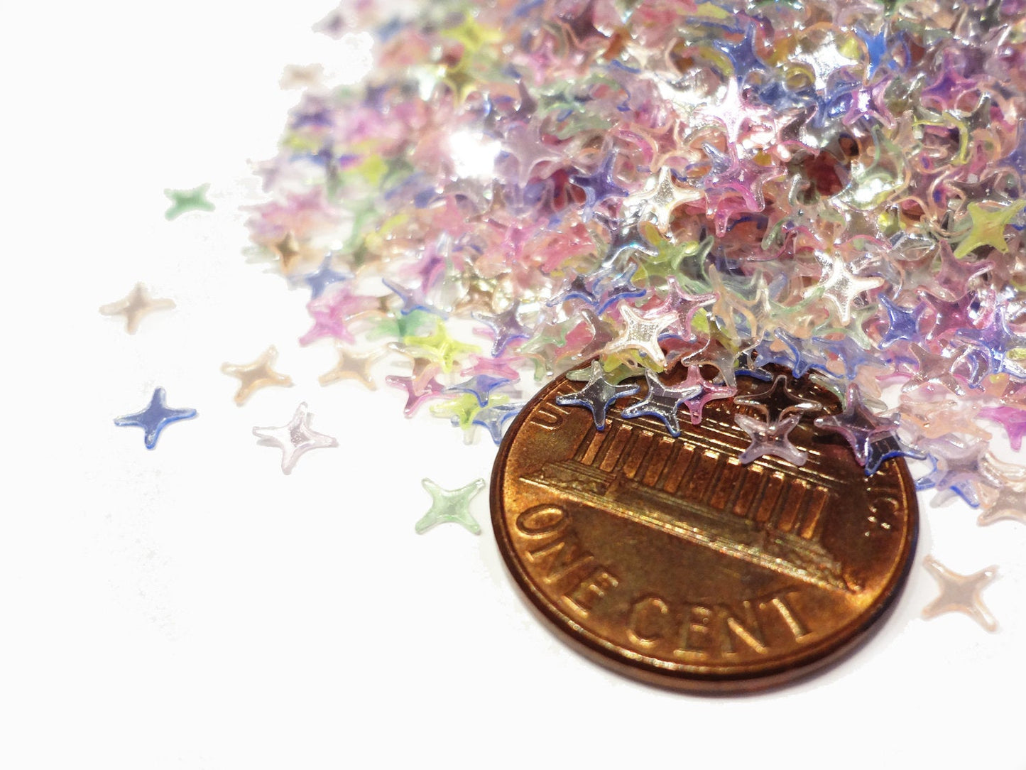 Load image into Gallery viewer, Translucent Pastel Rainbow Four Point Star Sequins, 4mm
