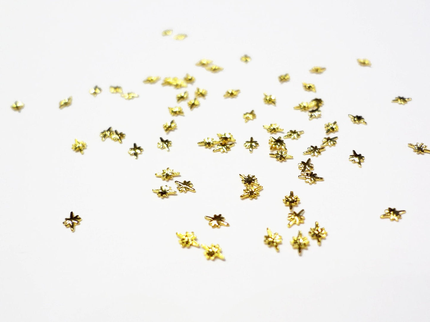 3x2mm Small Gold Starburst Studs