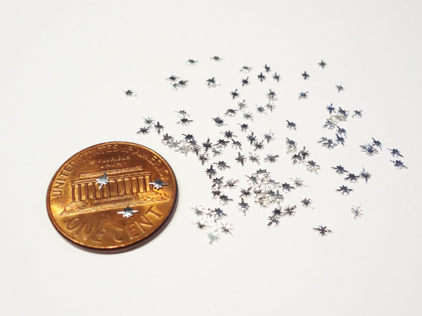 3x2mm Silver Small Starburst Studs