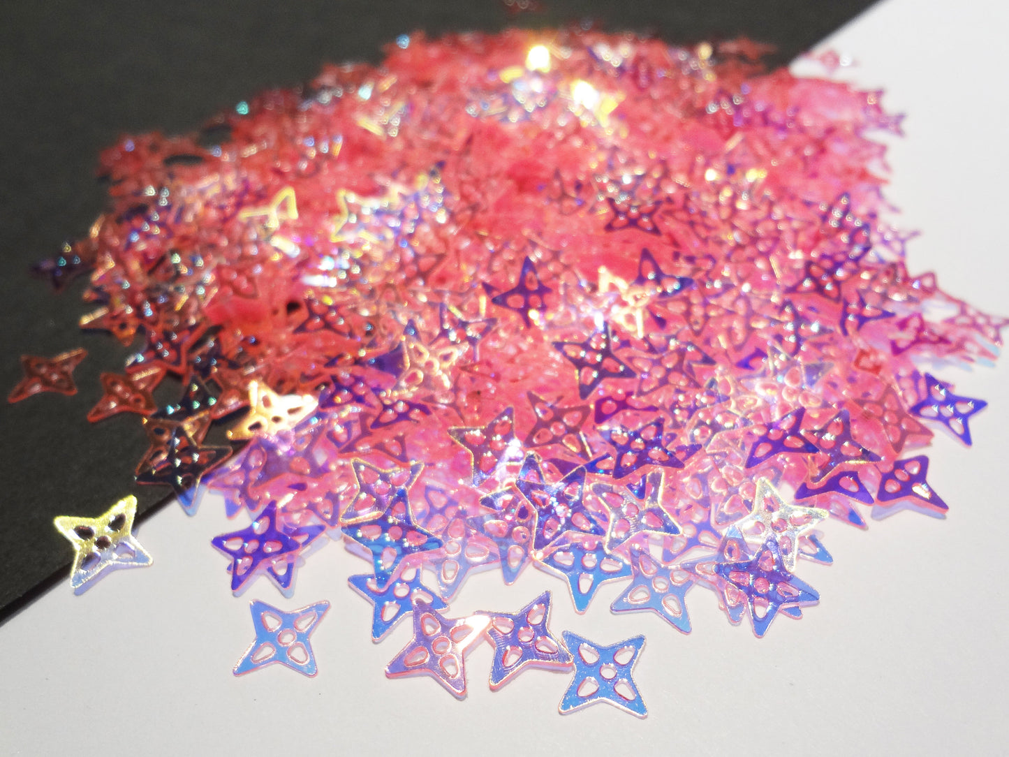 Load image into Gallery viewer, Translucent Iridescent Neon Pink Four Point Crystal Star Sequins, 8mm
