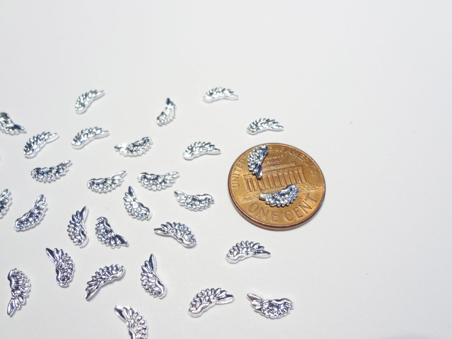 8x4mm 3D Silver Feather Wing