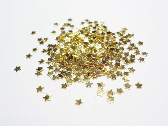Load image into Gallery viewer, 1.5mm Gold Tiny Star Studs
