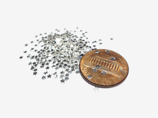 1.5mm Silver Tiny Star Studs