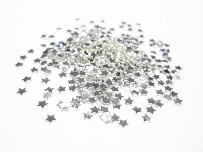 1.5mm Silver Tiny Star Studs