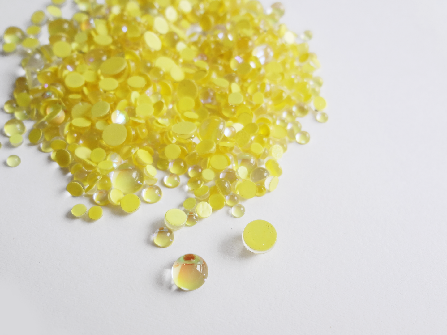 Load image into Gallery viewer, Iridescent Yellow Glass Bubble Effect Flatbacks, 1mm to 5mm Mixed Sizes
